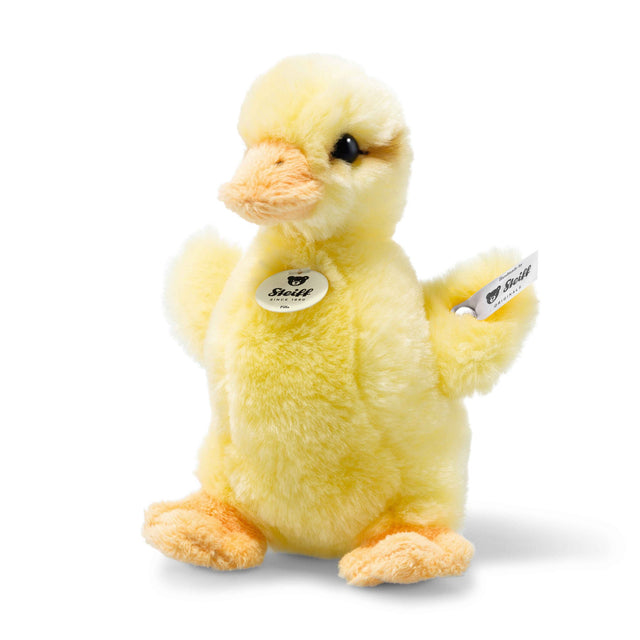 Duckling Pilla plush toy with soft yellow fur, sparkling safety eyes, and a hand-airbrushed face, perfect for gifts.