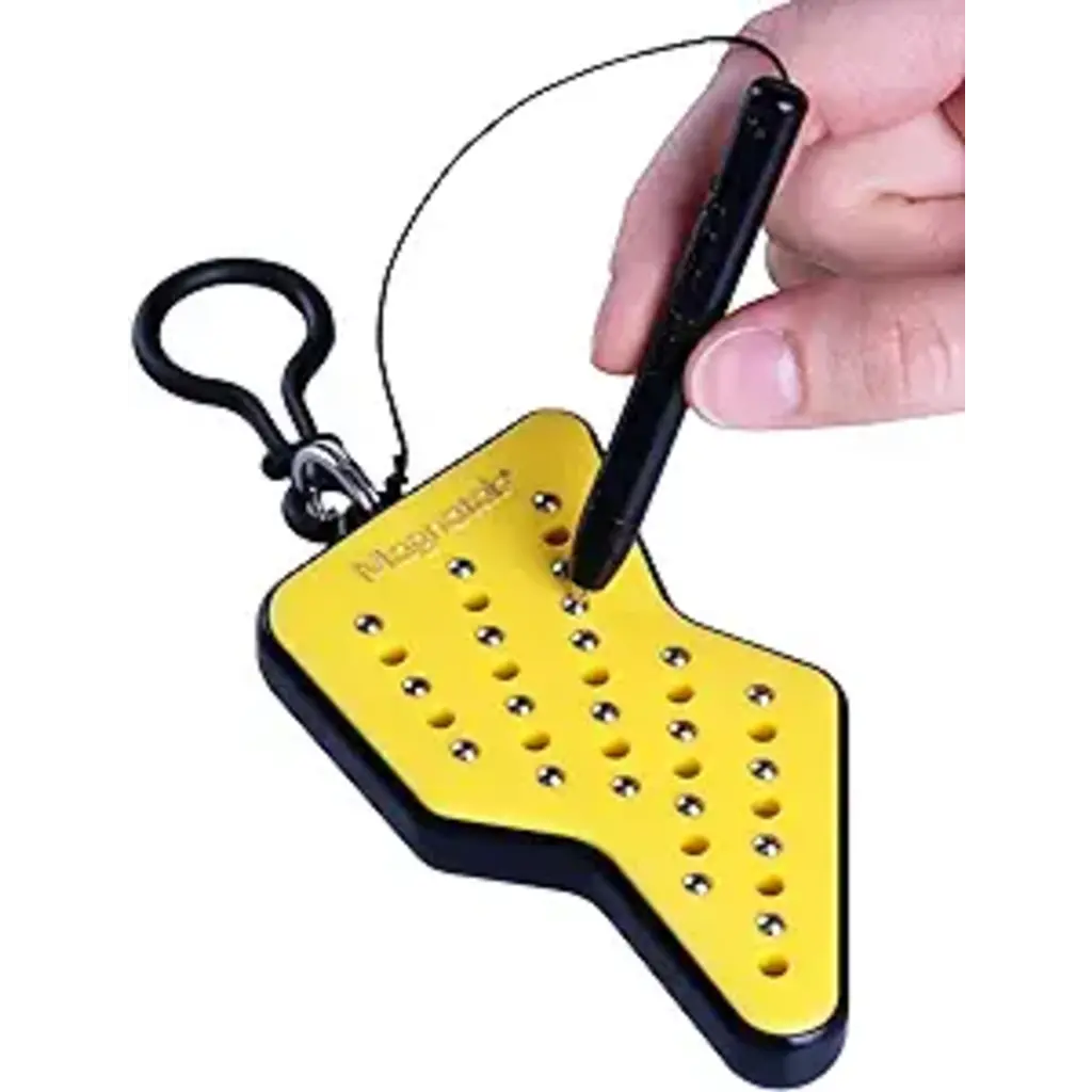 Hand holding stylus to move beads on yellow arrow-shaped Magnatab Mini magnetic drawing toy with clip for travel fun.