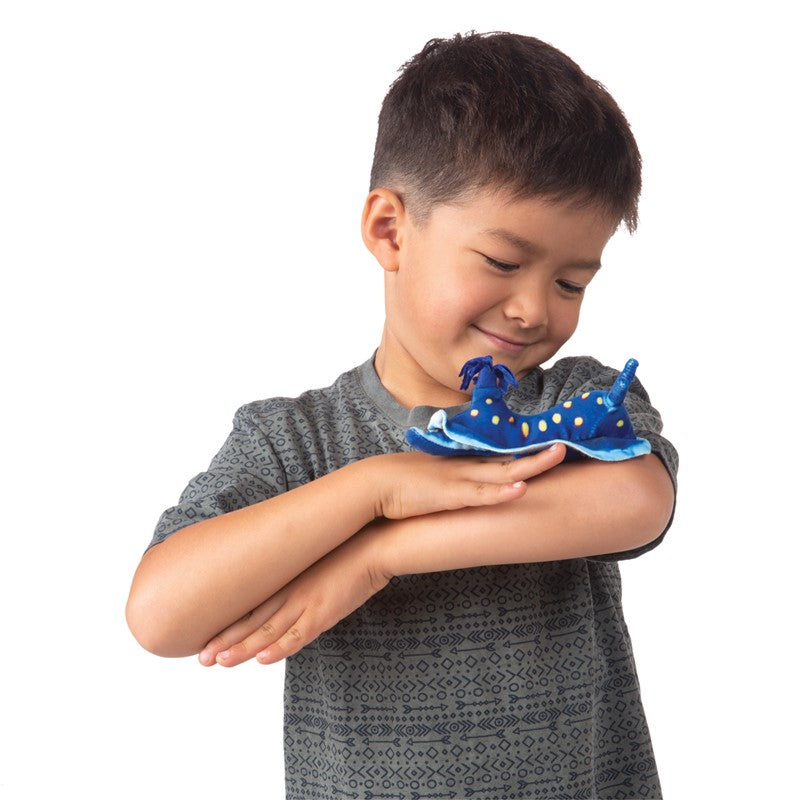 Boy playing with a weighted sensory Blue Nudibranch finger puppet on his arm, Blue Nudibranch Finger Puppet.