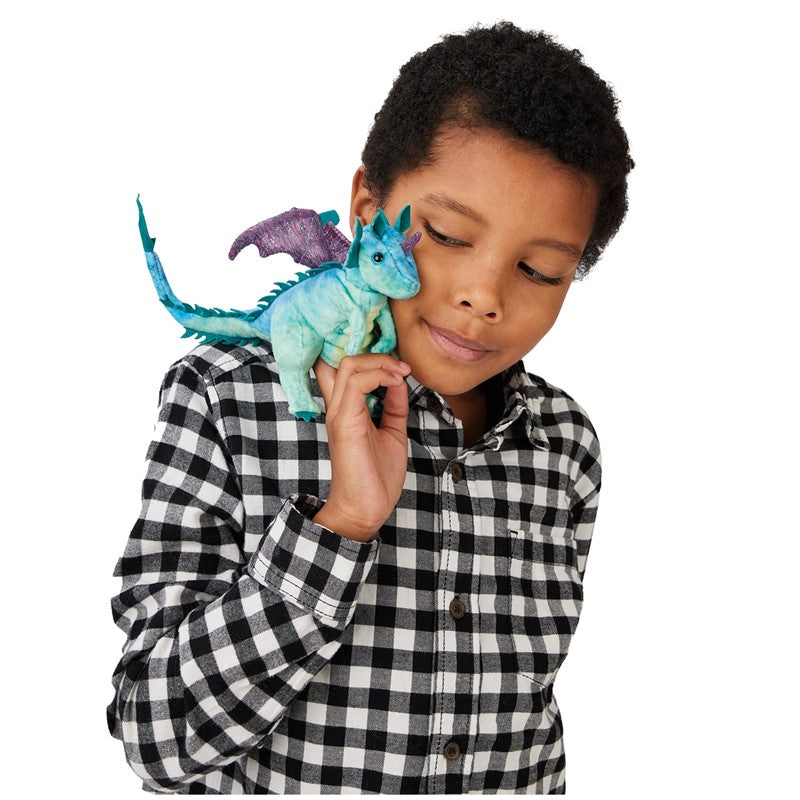 Child playing with a colorful Dragon Finger Puppet, inspiring creativity and fun fantasy stories.
