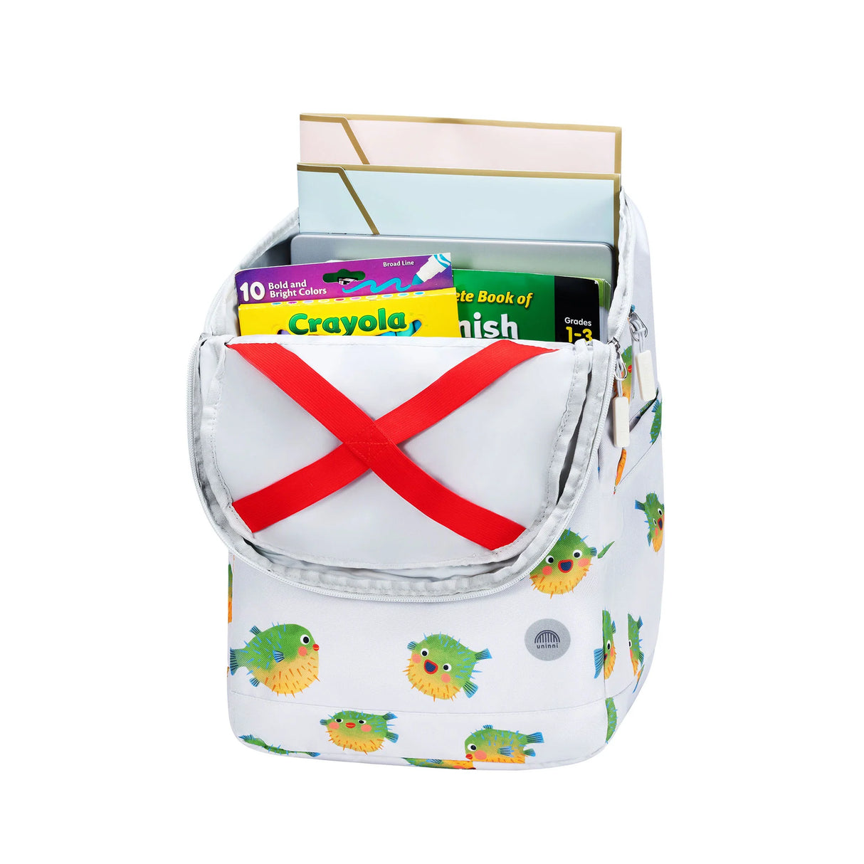 Backpack | Pufferfish with pufferfish print open showing school supplies inside and red straps securing contents.