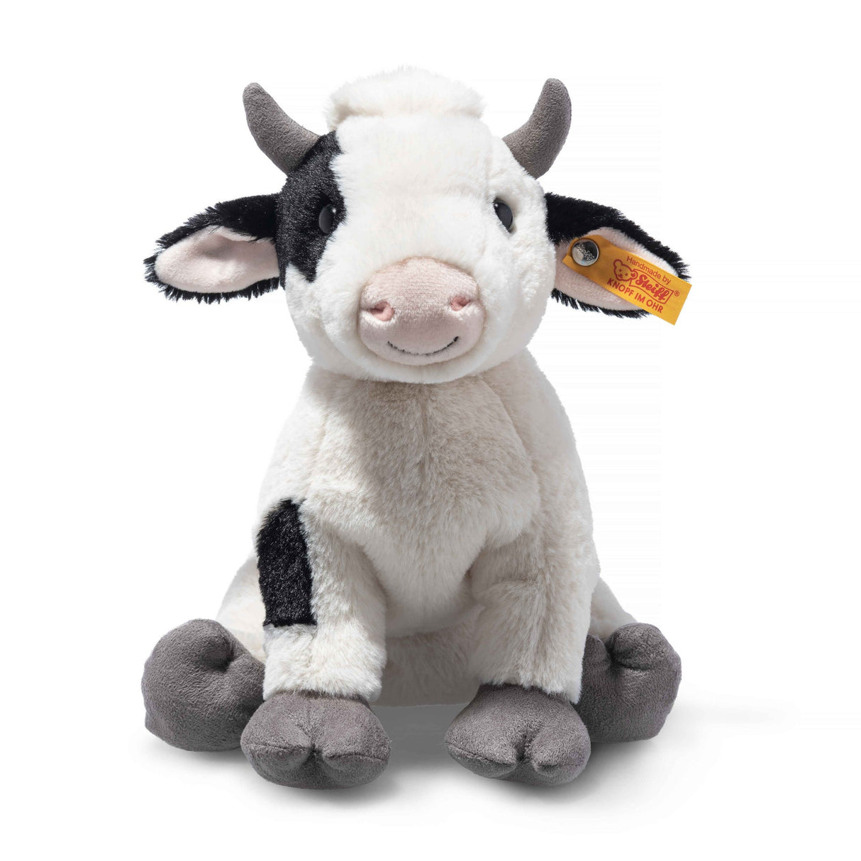 Cow Cobb plush toy sitting with soft grey hooves and playful horns, perfect cuddly farm animal companion.