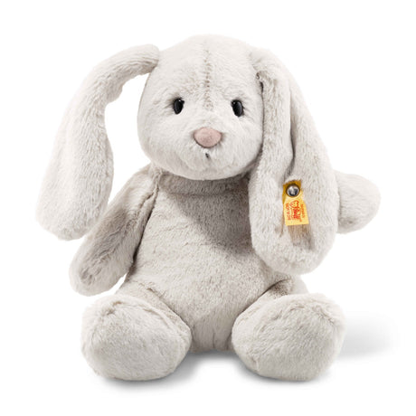 Bunny Rabbit Hoppie plush with soft gray fur, long floppy ears, pink nose, and button in ear detail sitting upright.