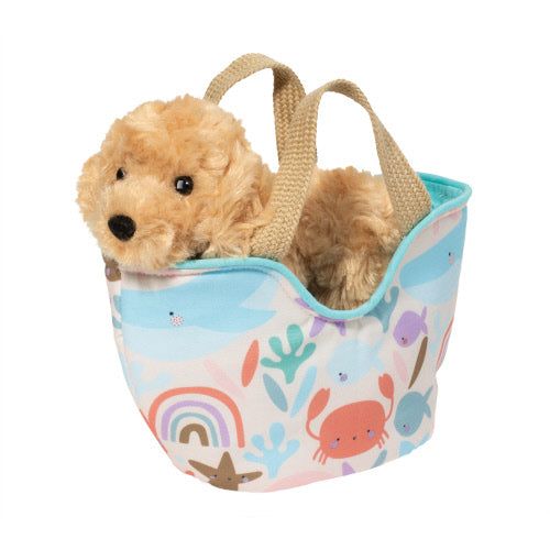 PetSak Under the Sea Golden featuring a plush golden retriever in a colorful ocean-themed pet carrier bag.