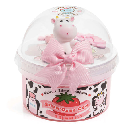 Straw-Dairy Cow 2 Slimes in 1 with pink bow, cow topper, and strawberry milk design in clear dome packaging.