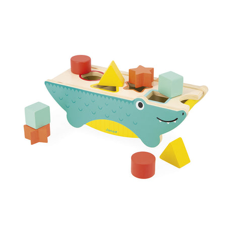 Tropik Crocodile Shape Sorter wooden toy with colorful shape blocks for children to match and learn shapes and colors.