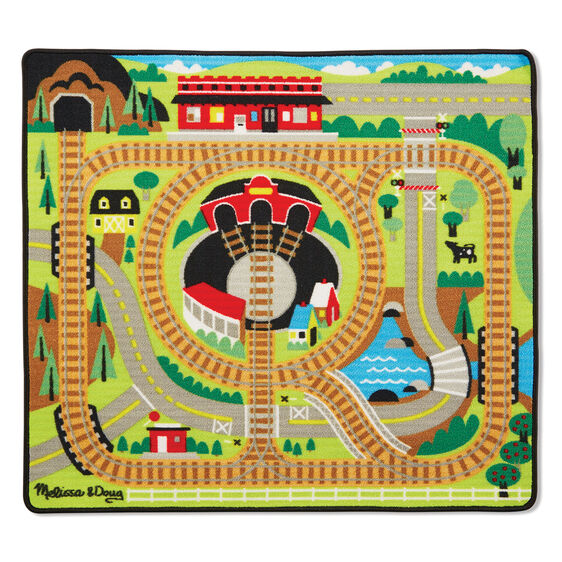 Round the Rails Train Rug with colorful railroad tracks, stations, roads, and scenic details for imaginative play.