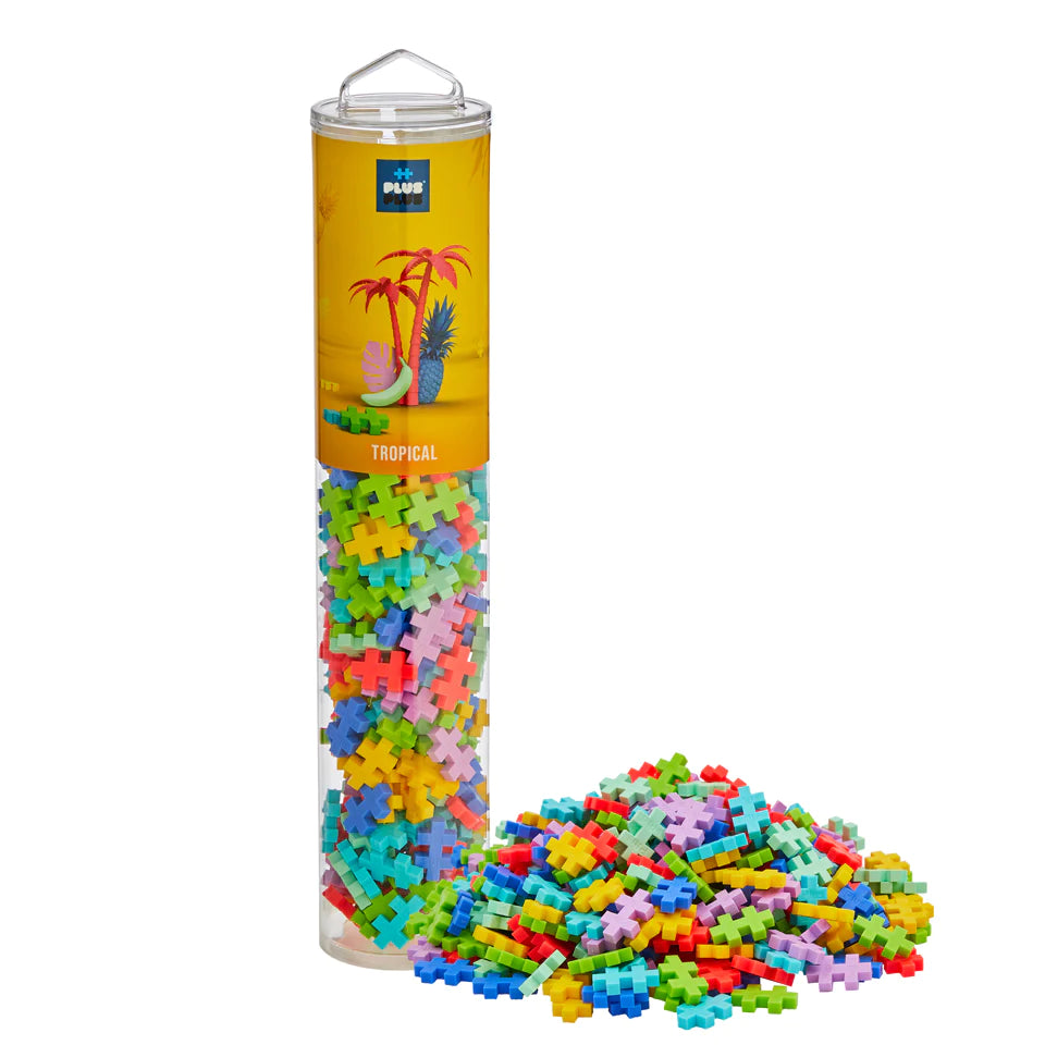Plus Plus Tropical 240pc colorful building pieces in a tall clear tube with scattered blocks for creative play.