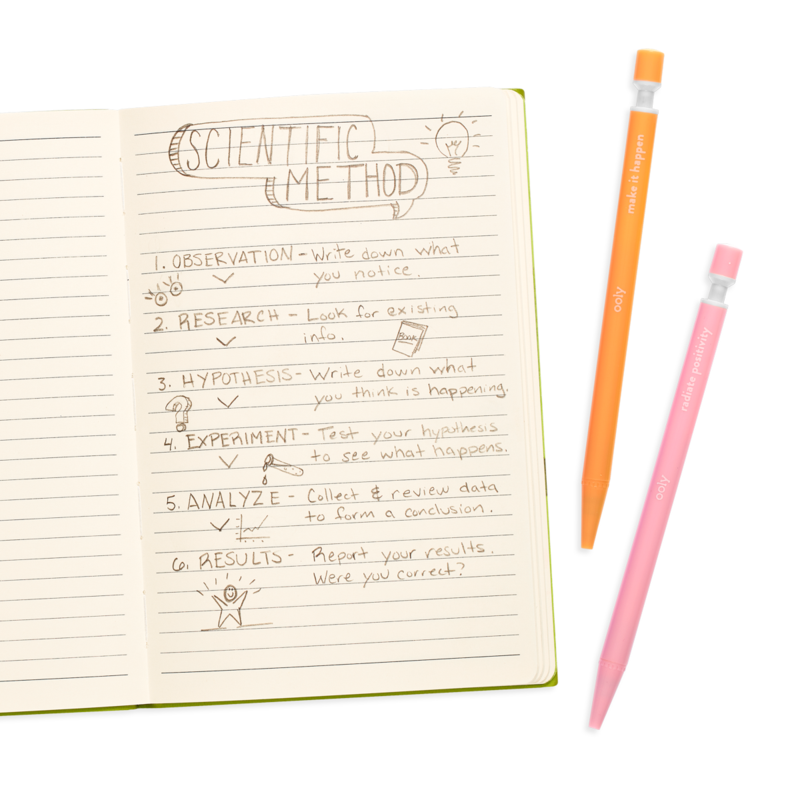 Noted Extra Thick Graphite Mechanical Pencils in orange and pink beside notebook with scientific method notes.