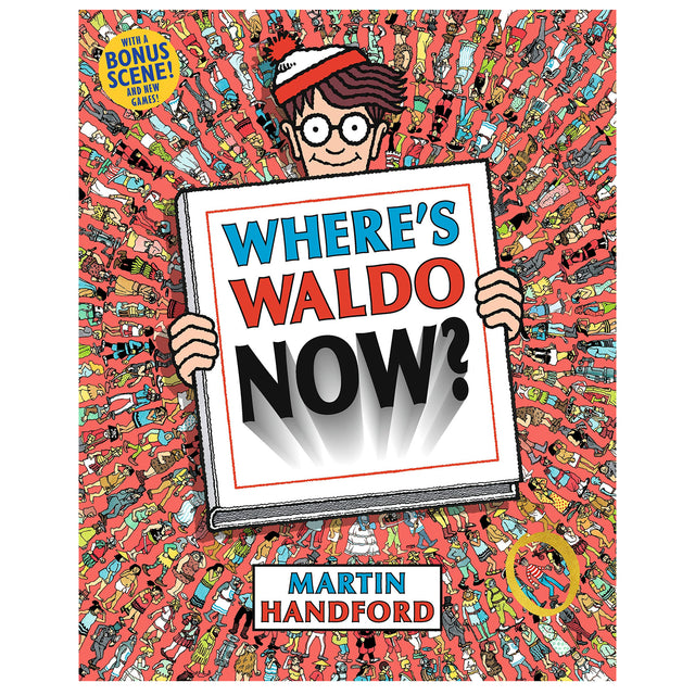 Where's Waldo Now? book cover featuring Waldo holding a sign amid a busy crowd of colorful characters.