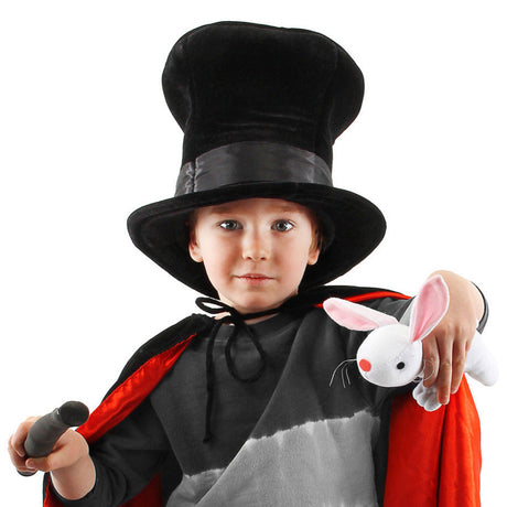 Child wearing Magician Hat w/Rabbit holding a wand and plush white rabbit in magician costume.