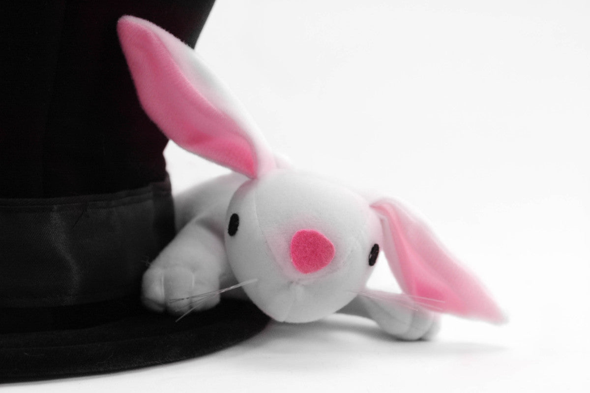 Close-up of the plush rabbit peeking from the black velvet elope Originals Magician Hat w/Rabbit.