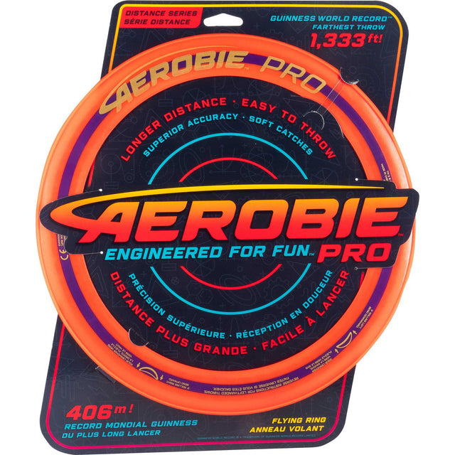 Aerobie Pro Ring with bright orange design, engineered for longer distance and soft catches, packaged for retail display.