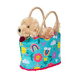 PetSak Happy Day Golden featuring a bright blue bag with sunshines, rainbows, and a plush Golden Retriever inside.