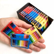 Mini Pencils in Pouch showing 12 colorful tiny pencils in red, yellow, and blue mini pouches held in hand.