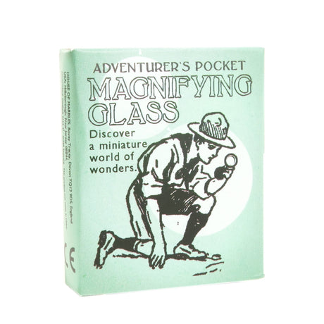 Adventurer's Magnifying Glass box with vintage explorer illustration, teaching the art of inspection for kids 5+ years.