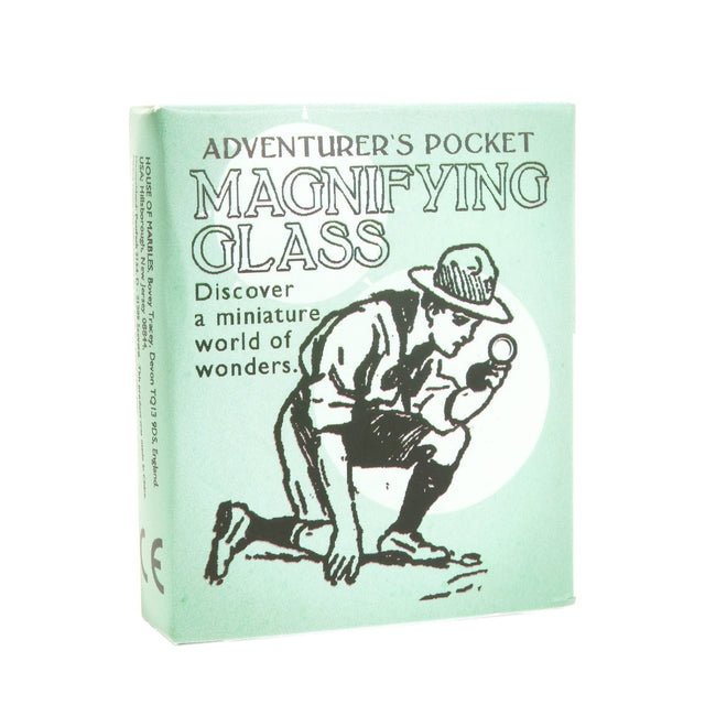 Adventurer's Magnifying Glass box with vintage explorer illustration, teaching the art of inspection for kids 5+ years.