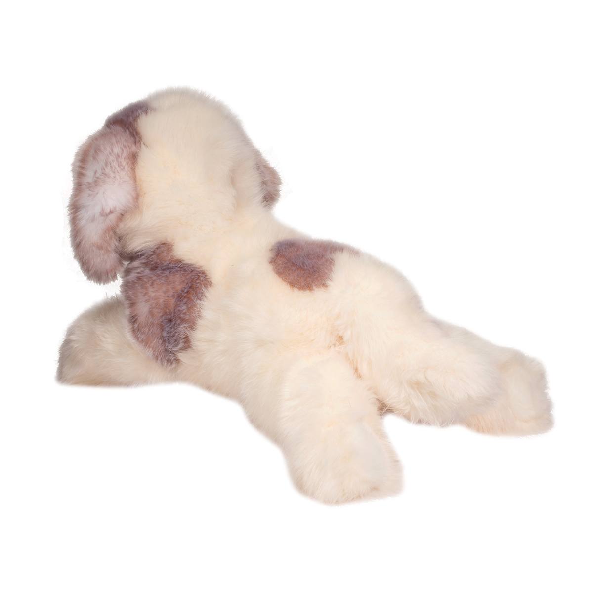 Plush stuffed dog lying down with soft cream and brown fur in the style of Great Pyrenees River product.