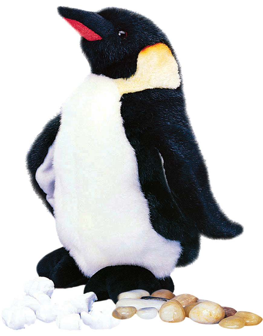 Emperor Penguin Waddles plush with soft fur and friendly face standing next to smooth stones and white pebbles.