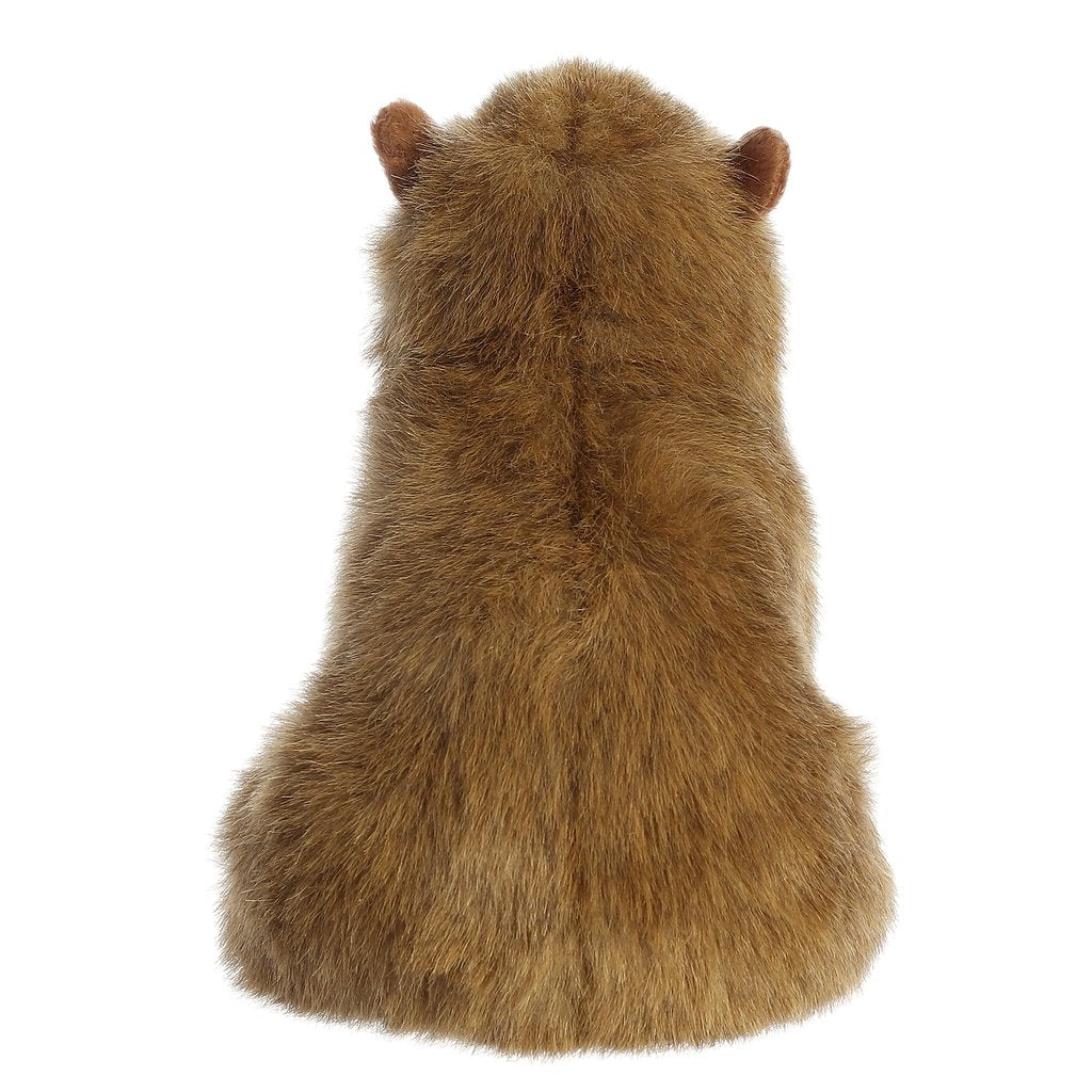 Capybara plush with soft brown fur, viewed from the back, sitting on hind legs, Miyoni collectible animal toy.