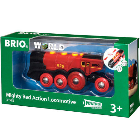 Mighty Red Locomotive toy train in packaging with red and black design, lights, sound effects, and age 3+ label.