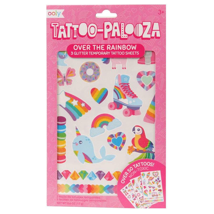 Over the Rainbow Tattoos temporary set with colorful glitter designs including rainbows, hearts, unicorns, and more for kids.