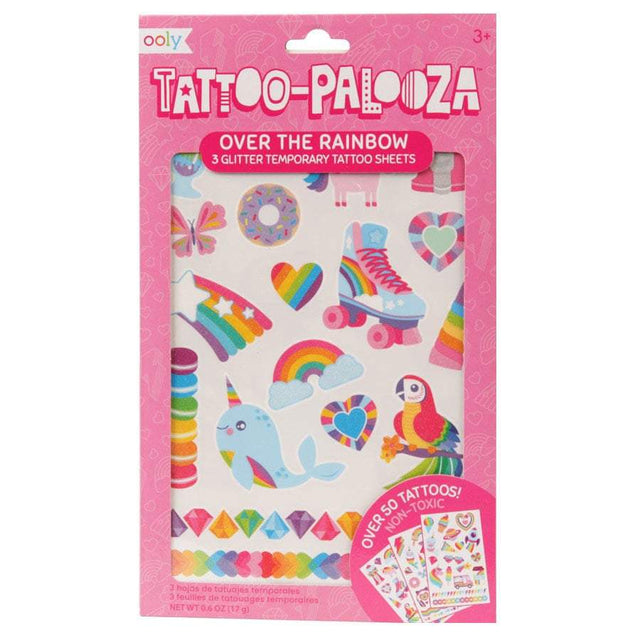 Over the Rainbow Tattoos temporary set with colorful glitter designs including rainbows, hearts, unicorns, and more for kids.