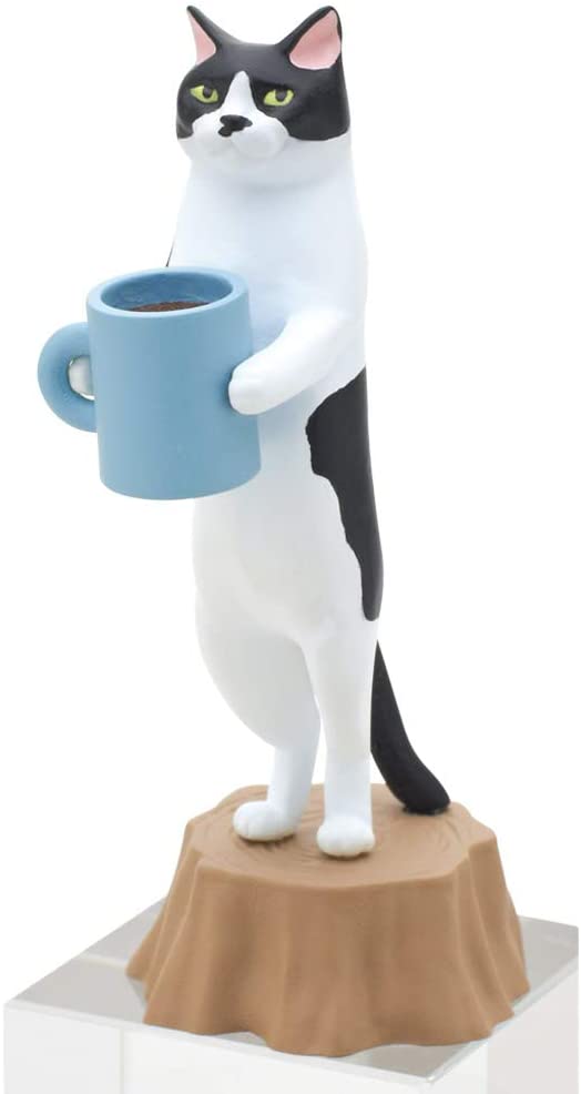 Cat Bakery Blind Box figure of black and white cat holding a blue coffee cup standing on a tree stump base.