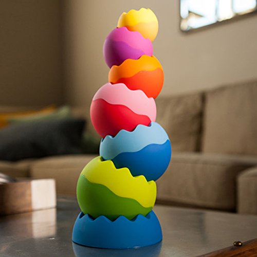 Tobbles Neo colorful, uniquely contoured stacking toy with six weighted pieces for sensory and motor skills play.