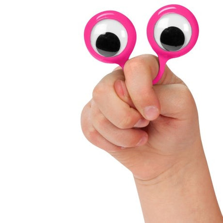 Hand holding Finger Eyes goofy plastic googly eyes puppet toy with pink frames for kids and fun play.