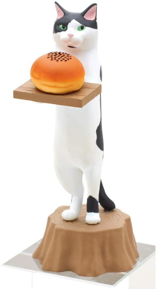 Cat Bakery Blind Box with a black and white cat holding a tray with a bread bun on a tree stump base.