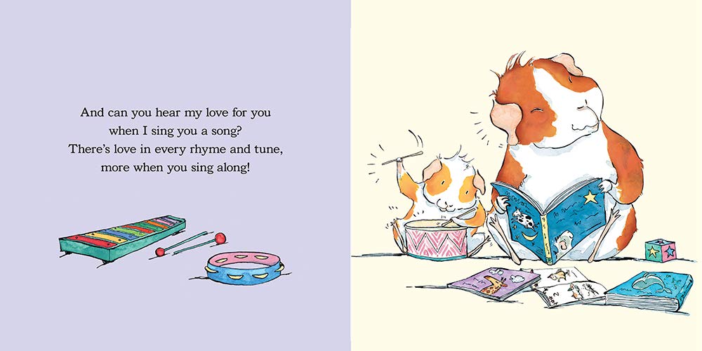 Open pages of "I Love You Little One" showing guinea pigs reading, tambourine, and xylophone illustrations.