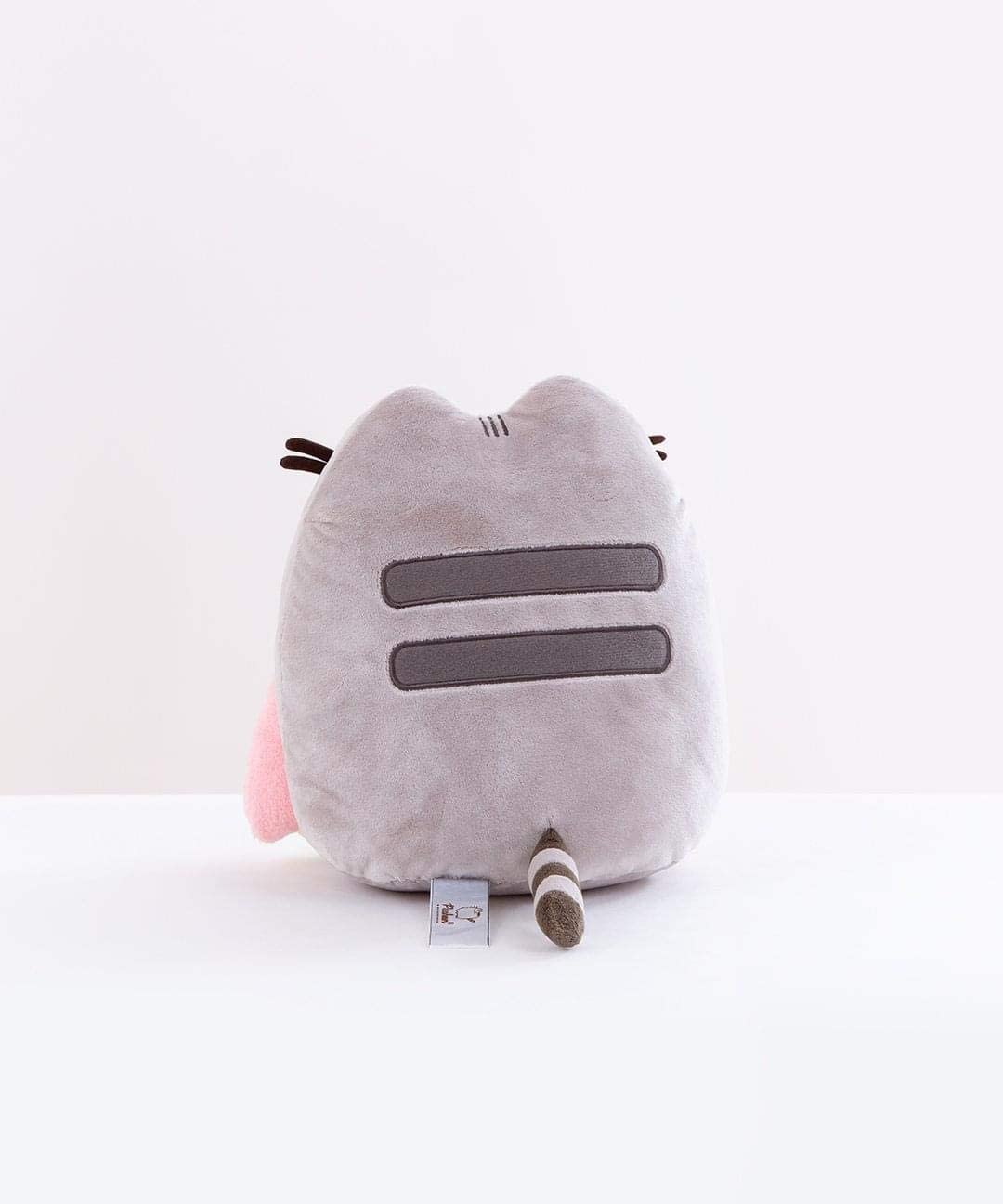 Rainbow Pusheen plush standing 9.5 inch soft toy with embroidered cheeks holding pastel rainbow front view