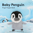 Baby Penguin with Finger Puppet featuring a cozy plush penguin puppet on a snowy blue board book cover.
