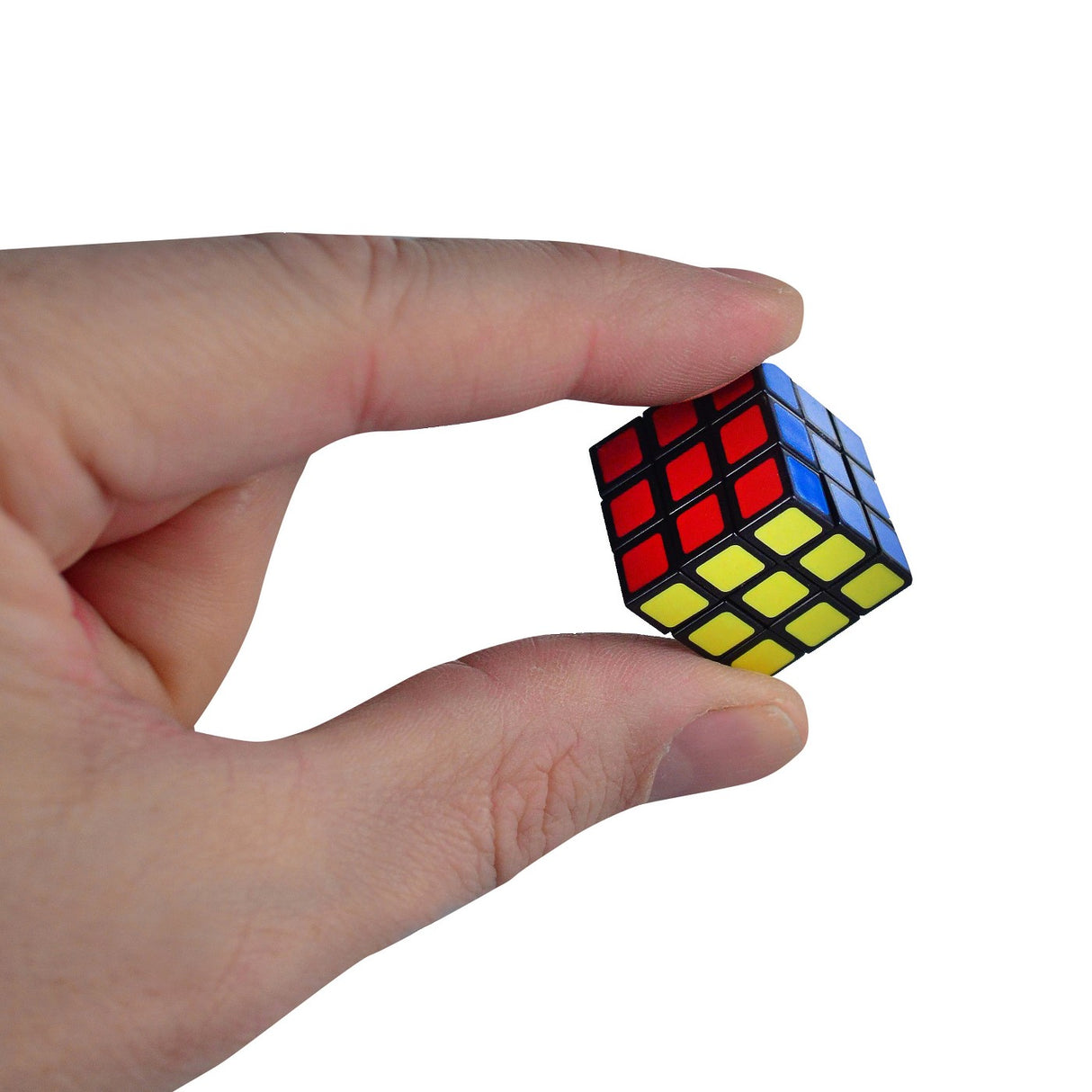 Hand holding the World's Smallest Rubiks cube, a compact 3x3 puzzle challenge for brain teaser fans.