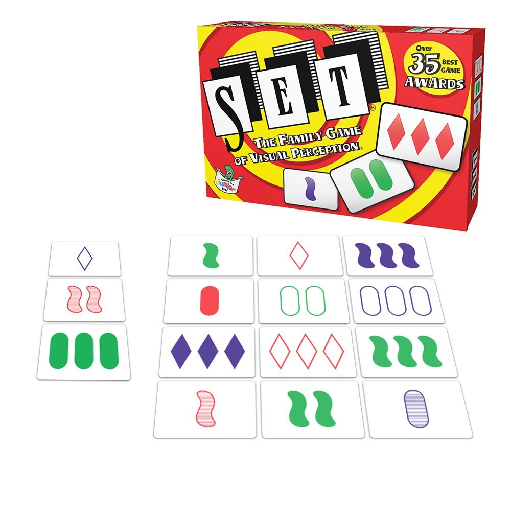 Set game box and cards displaying unique color, symbol, shading, and number features for visual perception play.