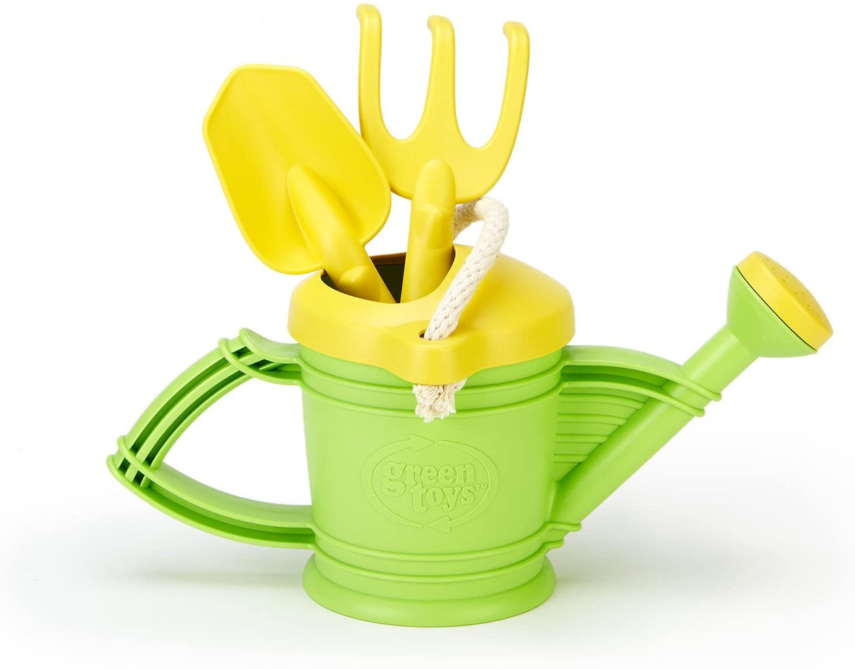 Green Toys™ Watering Can in green with yellow shovel and rake, made from 100% recycled plastic for kids' gardening fun.