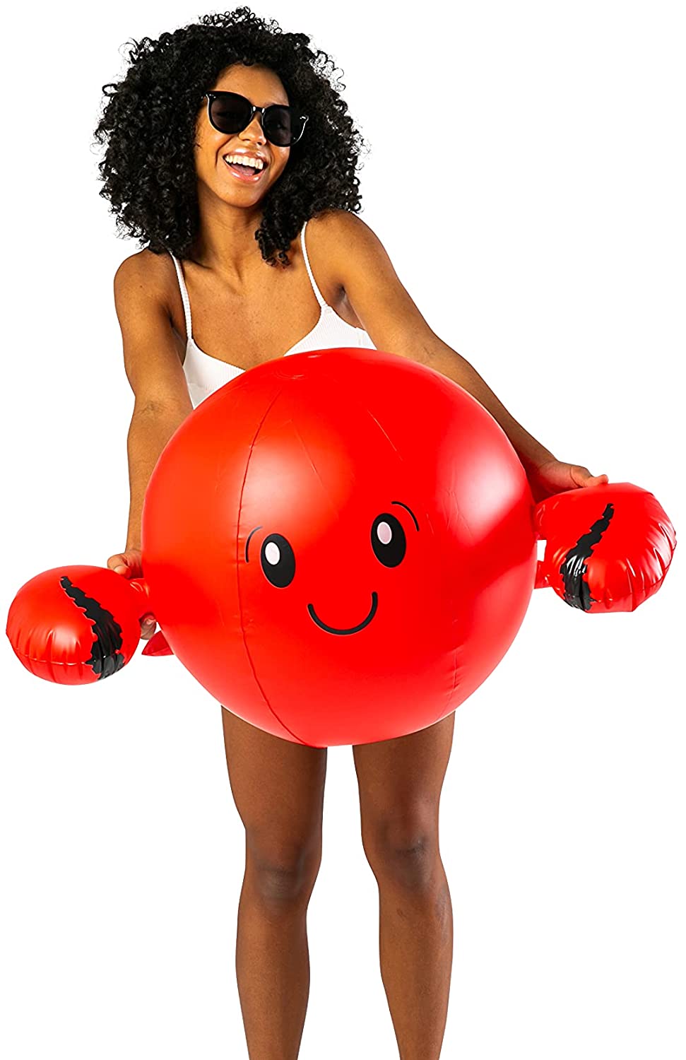 Woman holding bright red Beach Ball | Crab with smiling face and claws, perfect for the pool or beach fun.
