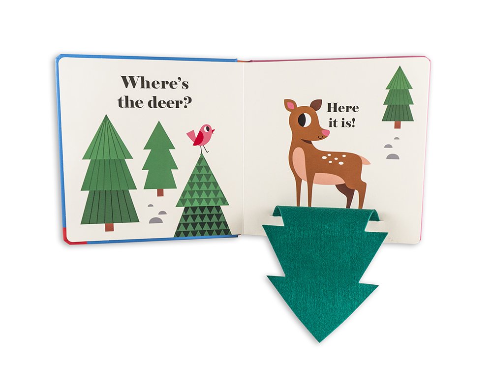 Where's the Owl? Flap Book open to a page with felt flap revealing a deer and illustrated trees.