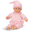 Mon Premier Bébé Calin Charming Pastel doll in pink pajamas and hat, 12-inch soft vinyl baby doll with sleepy eyes.