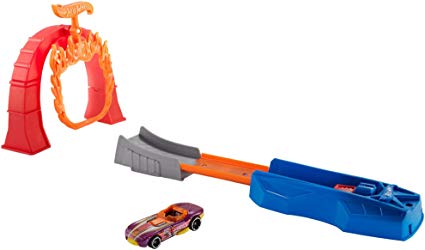 Hot Wheels Classic Stunts playset with orange launcher, flame jump, loop track, and purple Hot Wheels car for ages 4+