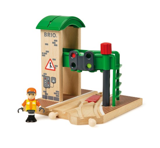 Signal Station toy with red knob to change train tracks and poseable play figure for imaginative play.