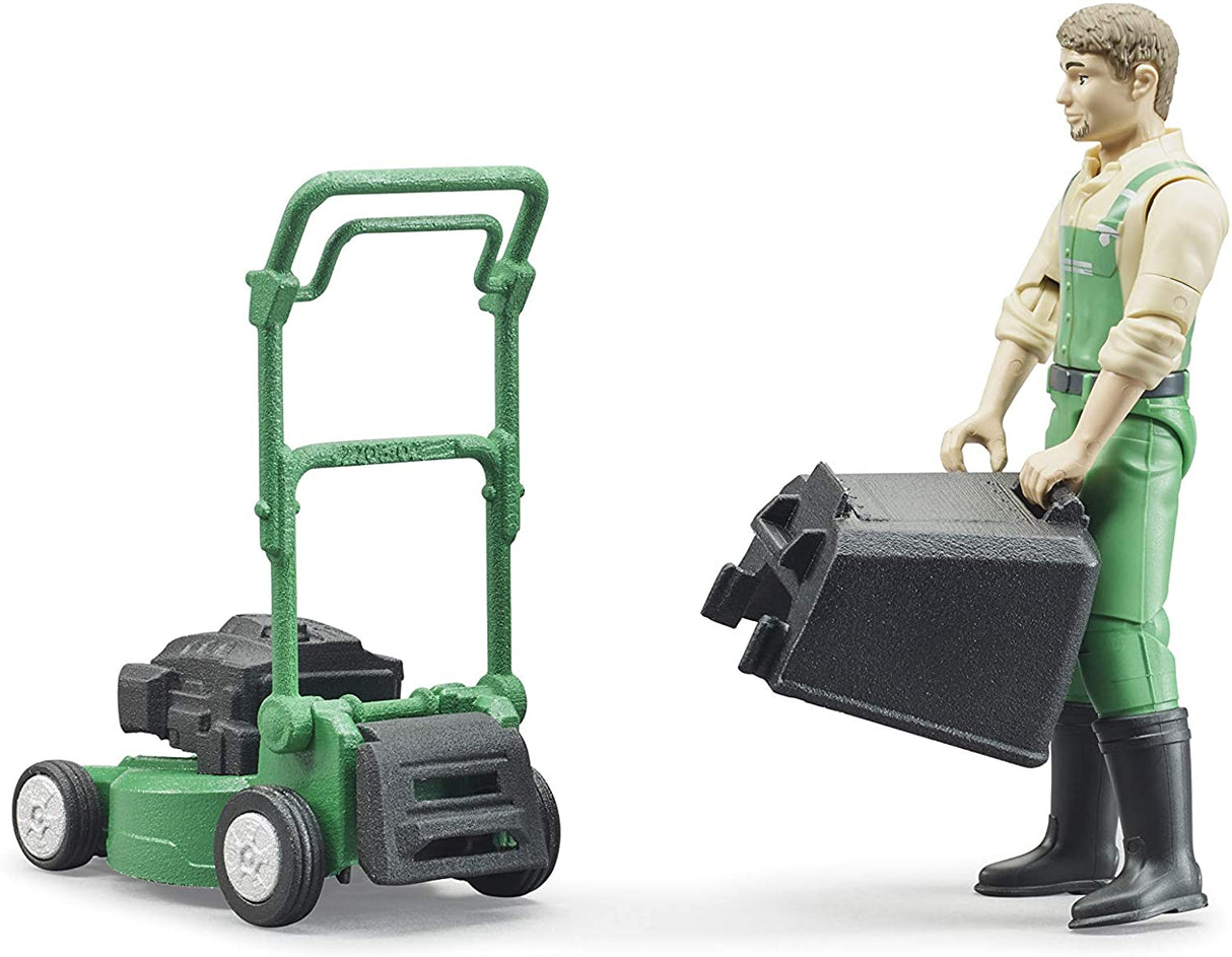 Jeffrey & Lawnmower toy figure in green overalls holding garden equipment with lawnmower for creative play.