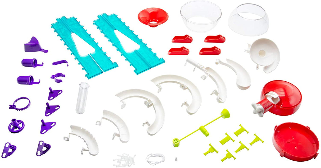 Gumball Machine Maker parts kit laid out showing colorful track pieces and components for building gumball machines.