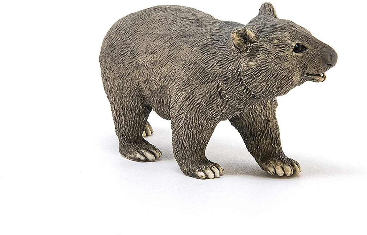 Wombat figurine with grey-brown fur, short legs, and detailed features from Schleich® Wild Life collection.