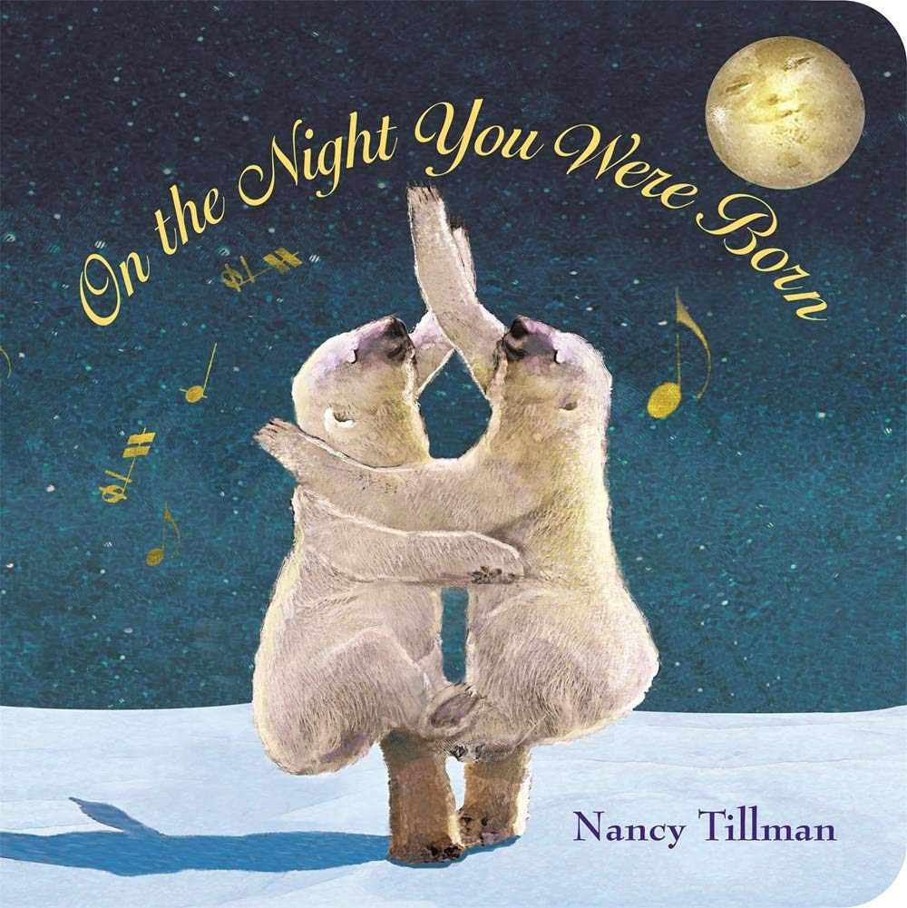 On the Night You Were Born board book cover with two dancing polar bears under a glowing moon by Nancy Tillman