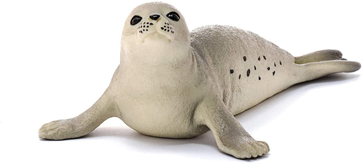 Seal plush toy lying down, soft gray with black spots, realistic design, perfect for kids aged 3 to 8 years.