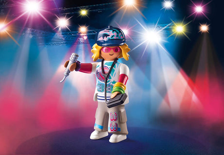 Playmo-Friends | Rapper figure with microphone, MP3 player, peaked cap, and colorful bracelets on a stage with bright lights.
