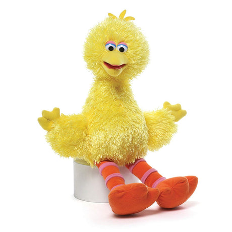 Big Bird plush toy with soft yellow fur, orange striped legs, and friendly expression, perfect for cuddling and display.