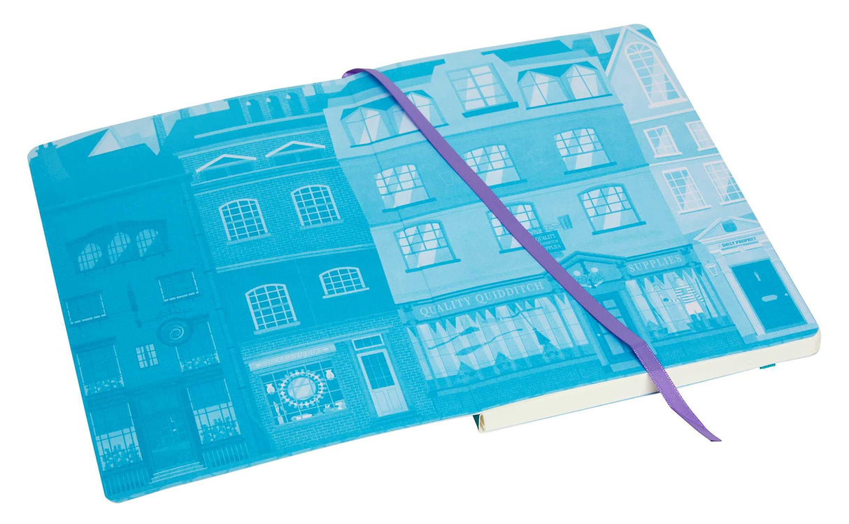 Exploring Diagon Alley Notebook with whimsical blue storefront artwork, elastic band closure, and purple ribbon marker.